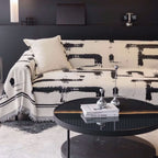 Soft monochrome sofa cover made from breathable, pet-friendly fabric. Designed to protect and enhance your couch, it features a sleek, modern look that fits 1