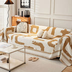 Soft monochrome sofa cover made from breathable, pet-friendly fabric. Designed to protect and enhance your couch, it features a sleek, modern look that fits 10