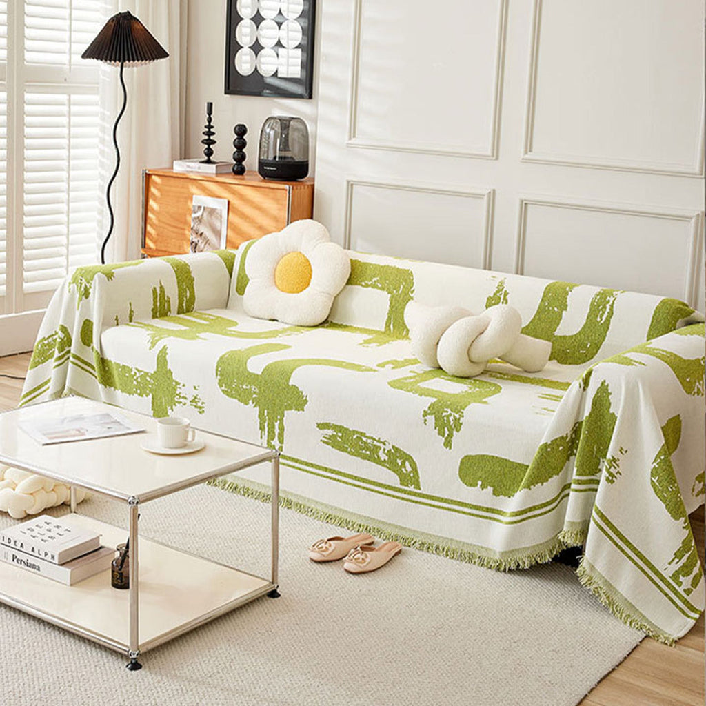 Soft monochrome sofa cover made from breathable, pet-friendly fabric. Designed to protect and enhance your couch, it features a sleek, modern look that fits 11