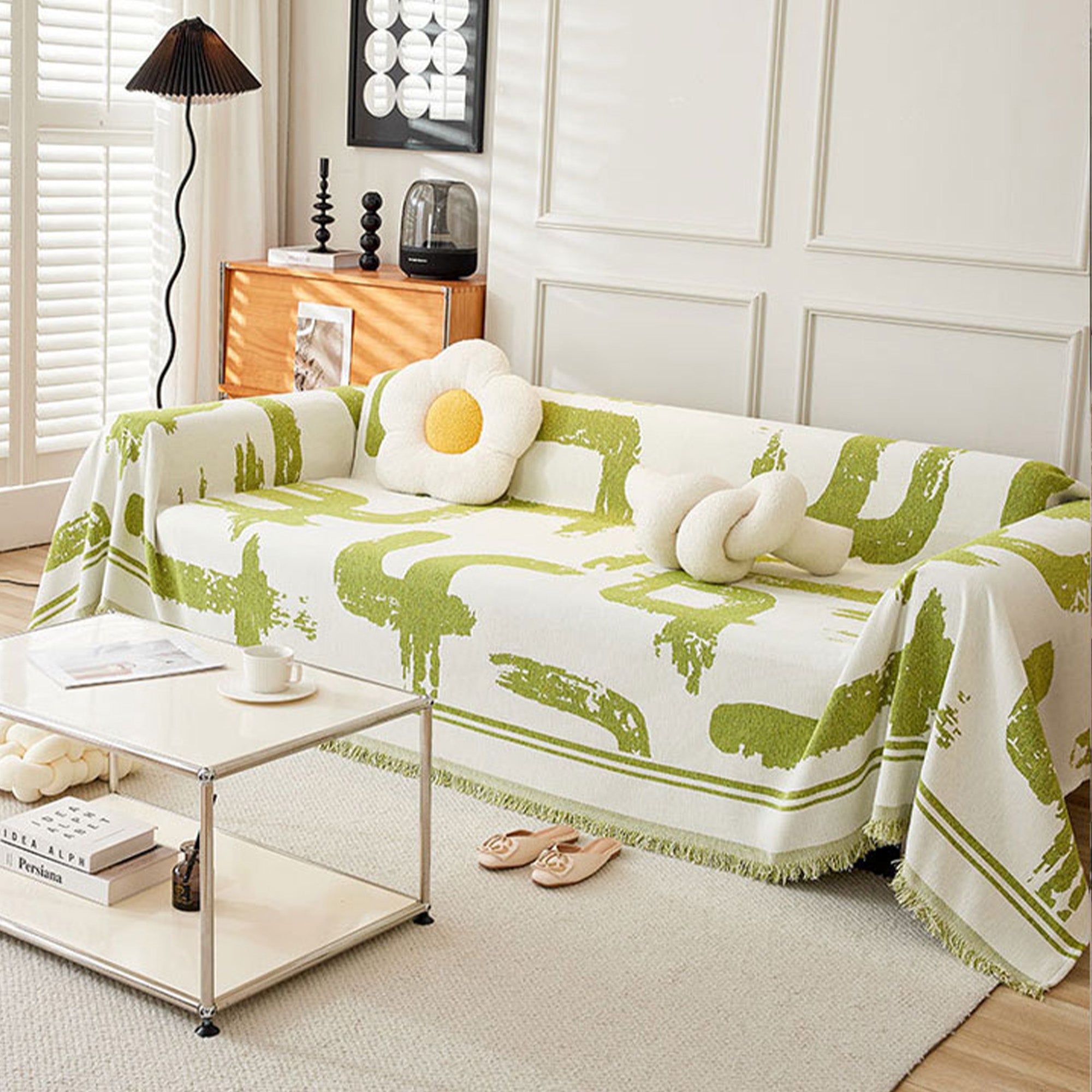 Soft monochrome sofa cover made from breathable, pet-friendly fabric. Designed to protect and enhance your couch, it features a sleek, modern look that fits 11