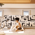 Soft monochrome sofa cover made from breathable, pet-friendly fabric. Designed to protect and enhance your couch, it features a sleek, modern look that fits 2