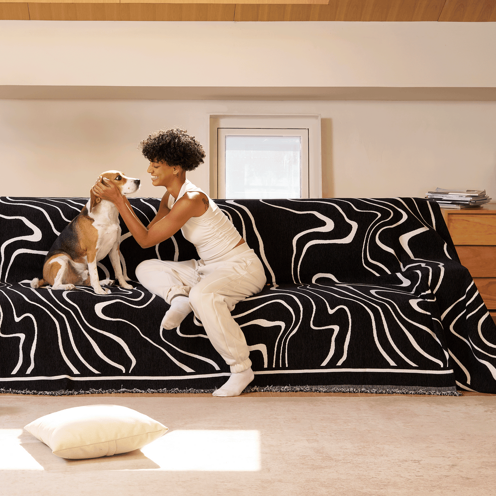 Soft monochrome sofa cover made from breathable, pet-friendly fabric. Designed to protect and enhance your couch, it features a sleek, modern look that fits 6