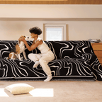 Soft monochrome sofa cover made from breathable, pet-friendly fabric. Designed to protect and enhance your couch, it features a sleek, modern look that fits 6