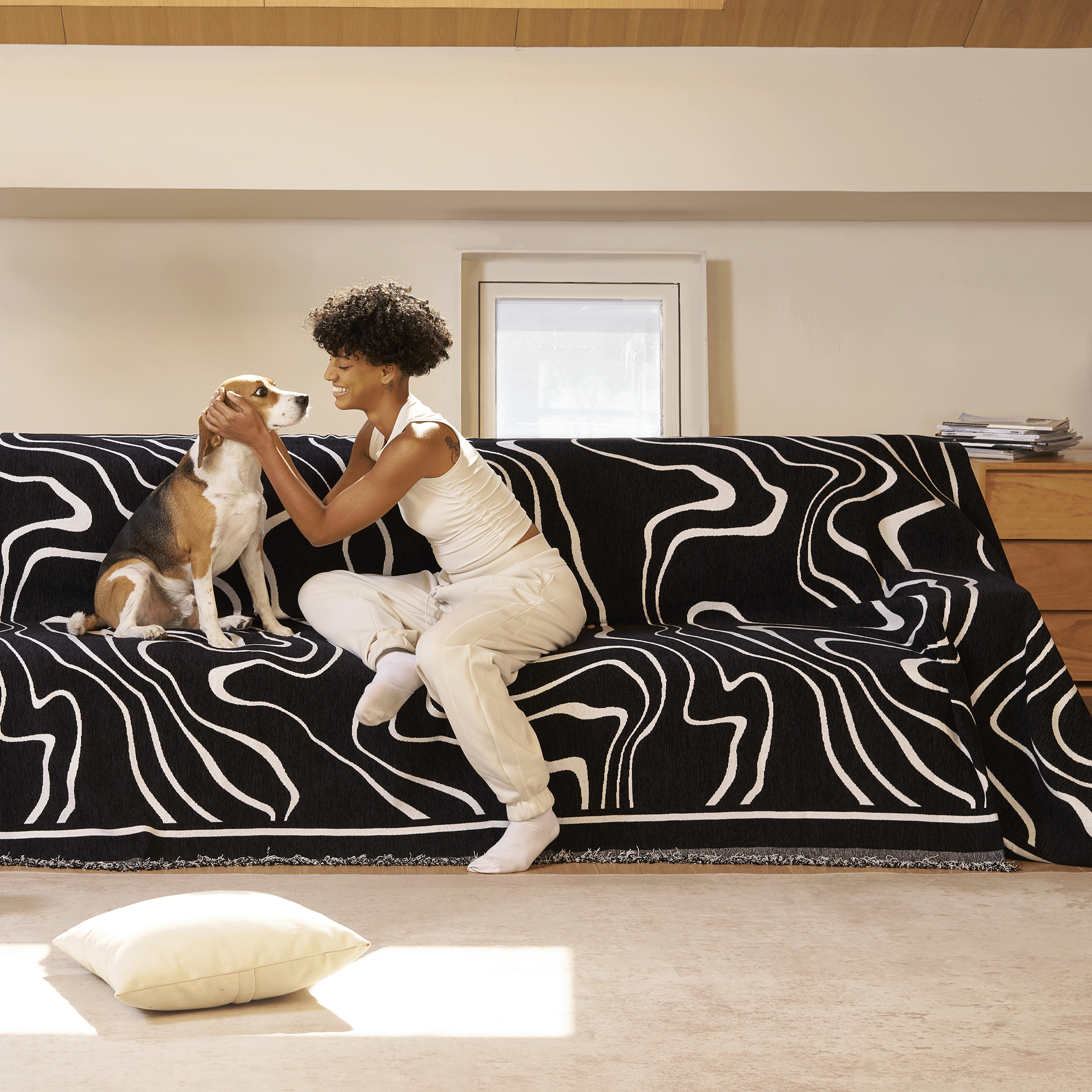 Soft monochrome sofa cover made from breathable, pet-friendly fabric. Designed to protect and enhance your couch, it features a sleek, modern look that fits 6