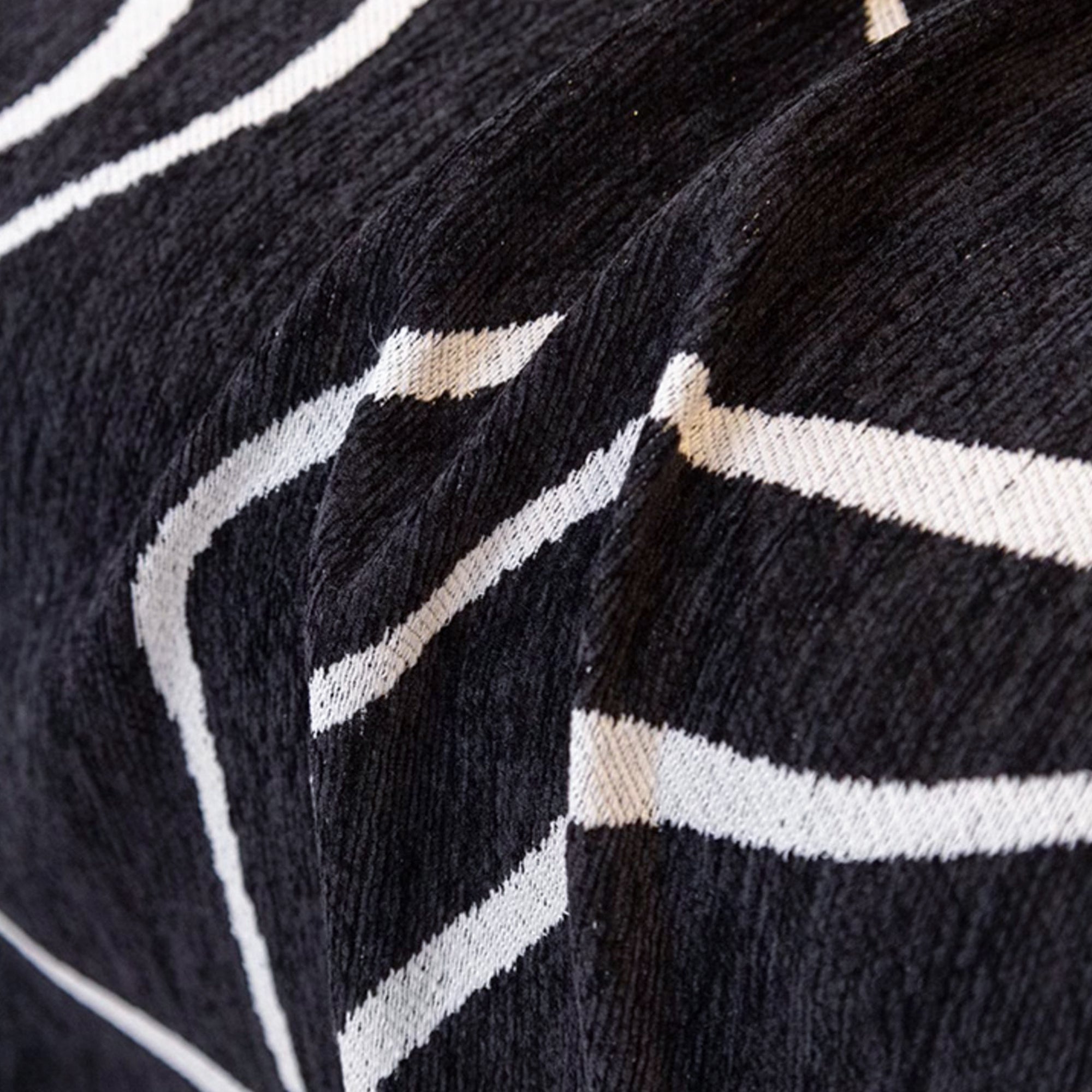 Soft monochrome sofa cover made from breathable, pet-friendly fabric. Designed to protect and enhance your couch, it features a sleek, modern look that fits 8