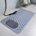 Non-slip shower bath mat featuring a built-in foot scrubber for enhanced safety. Made of durable, water-resistant material in a soft gray color, it 0