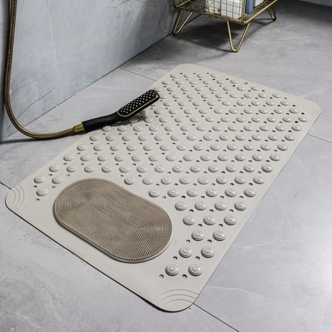 Non-slip shower bath mat featuring a built-in foot scrubber for added safety. Made from durable, water-resistant material in a calming light blue color. 3