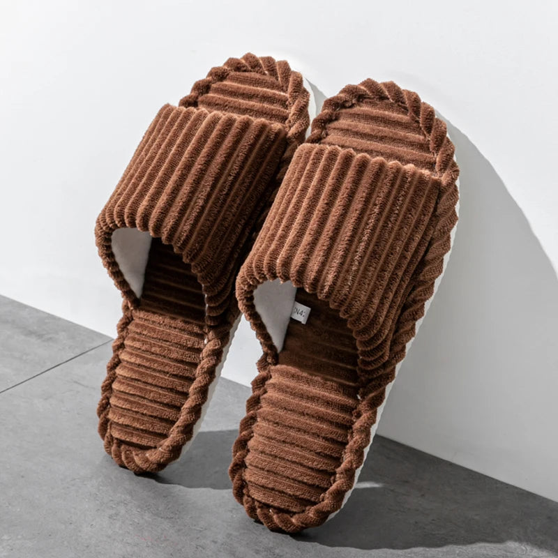 Open slippers featuring a stylish striped design, crafted from breathable cotton material for comfort. Ideal for indoor use, they come in a soft color palette, providing 4
