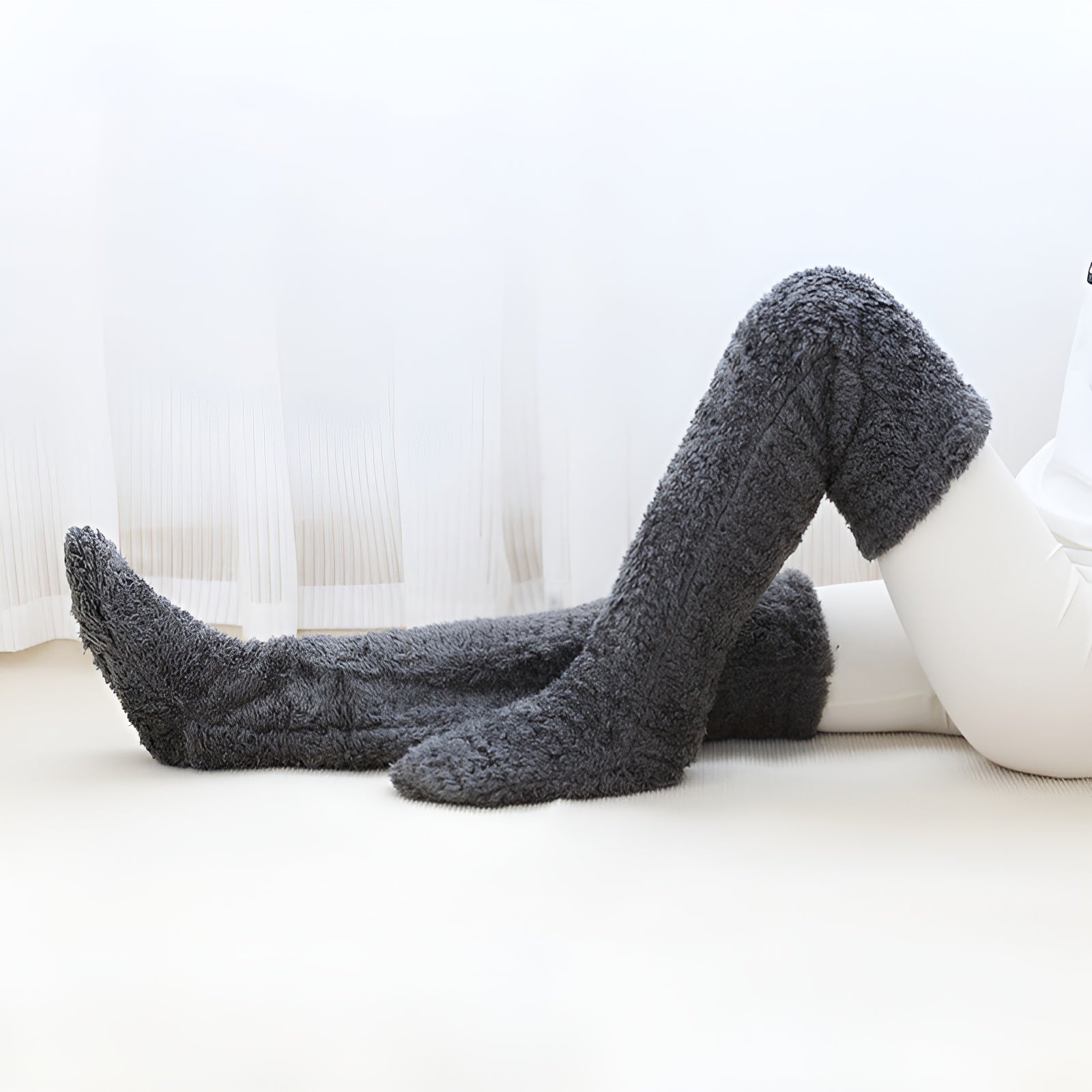 Cozy over-the-knee socks made from soft, warm material, available in various colors. Perfect winter accessory for added warmth and style, featuring a 5