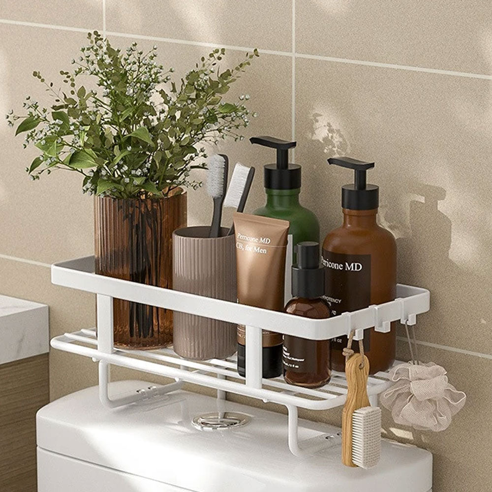 White wrought iron over-the-toilet storage shelf featuring a multi-layer design for optimal space efficiency. Ideal for organizing bathroom essentials, it combines elegance with functionality 0