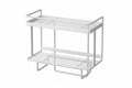 White wrought iron over-the-toilet storage shelf featuring a multi-layer design for optimal space efficiency. Ideal for organizing bathroom essentials, it combines elegance with functionality 2