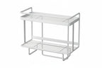 White wrought iron over-the-toilet storage shelf featuring a multi-layer design for optimal space efficiency. Ideal for organizing bathroom essentials, it combines elegance with functionality 2