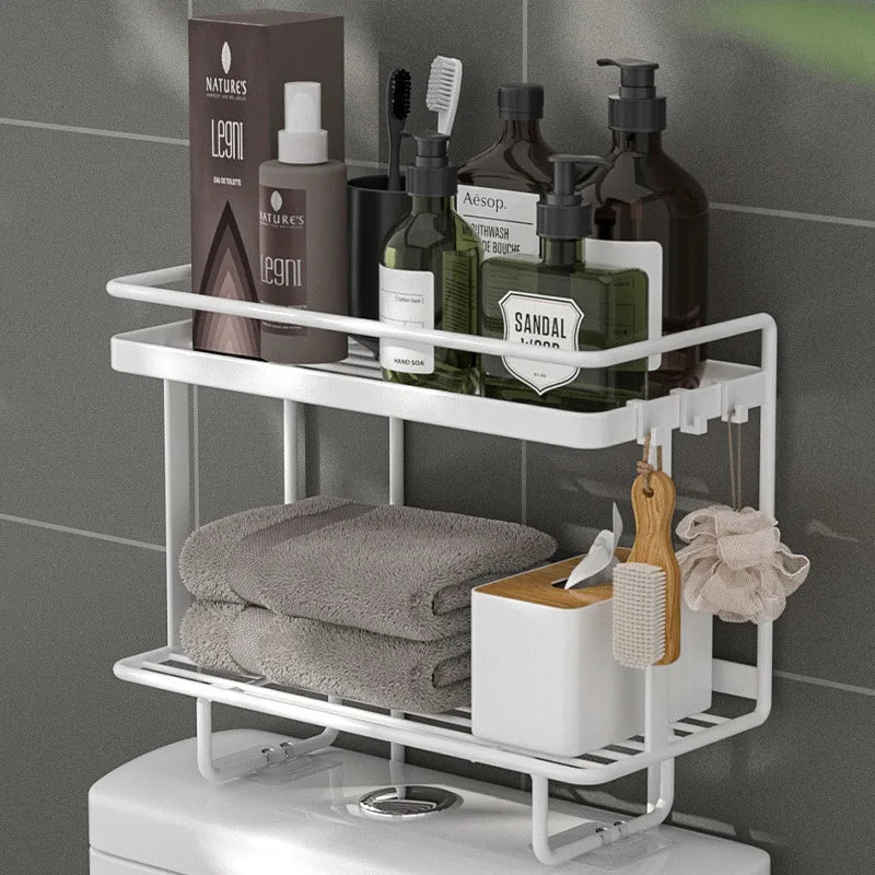 White wrought iron over-the-toilet storage shelf featuring a multi-layer design for optimal space efficiency. Ideal for organizing bathroom essentials, it combines elegance with functionality 9