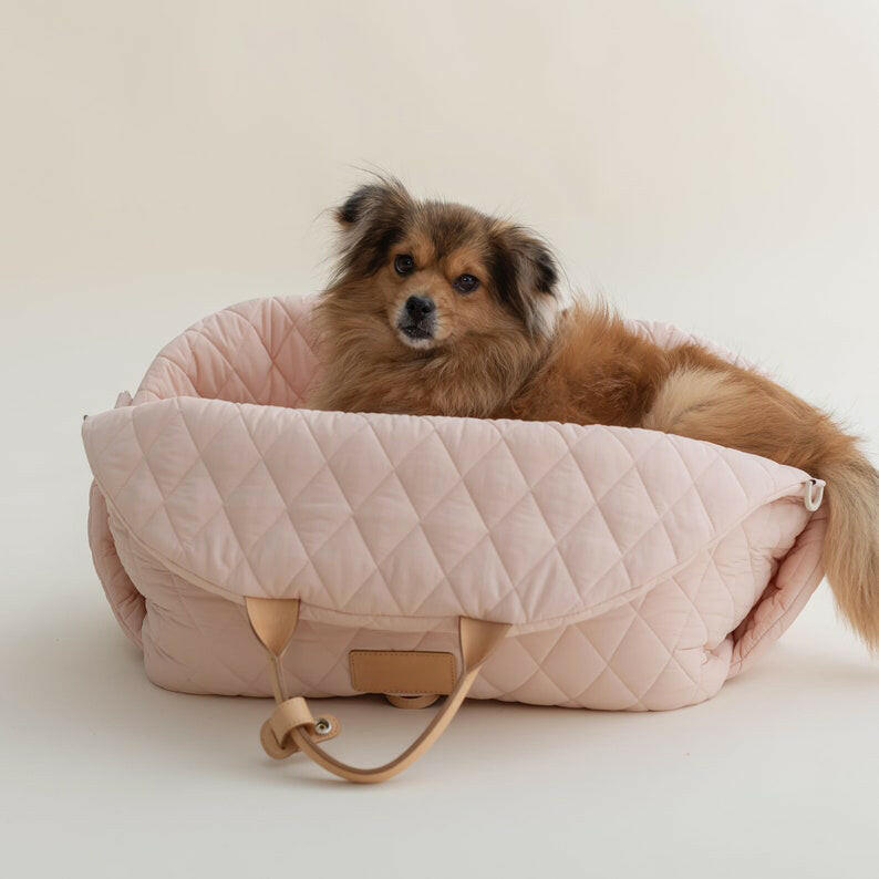 Beige quilted fabric pet carrier, versatile 2-in-1 design for car seat and carrier use. Dimensions: 17.3 x  0