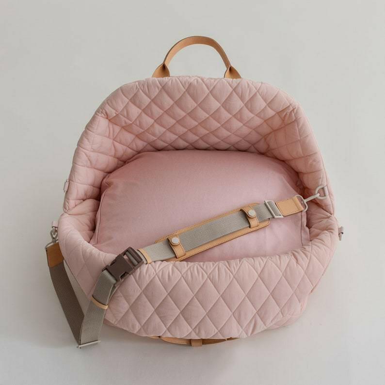 Beige quilted fabric pet carrier designed as a 2-in-1 car seat and carrier. Measures 17.3 x 13.4 3