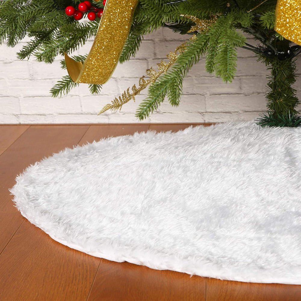 Cozy 30-inch plush faux fur Christmas tree skirt in soft white with a luxurious texture, perfect for adding warmth and elegance to your holiday decor. 0
