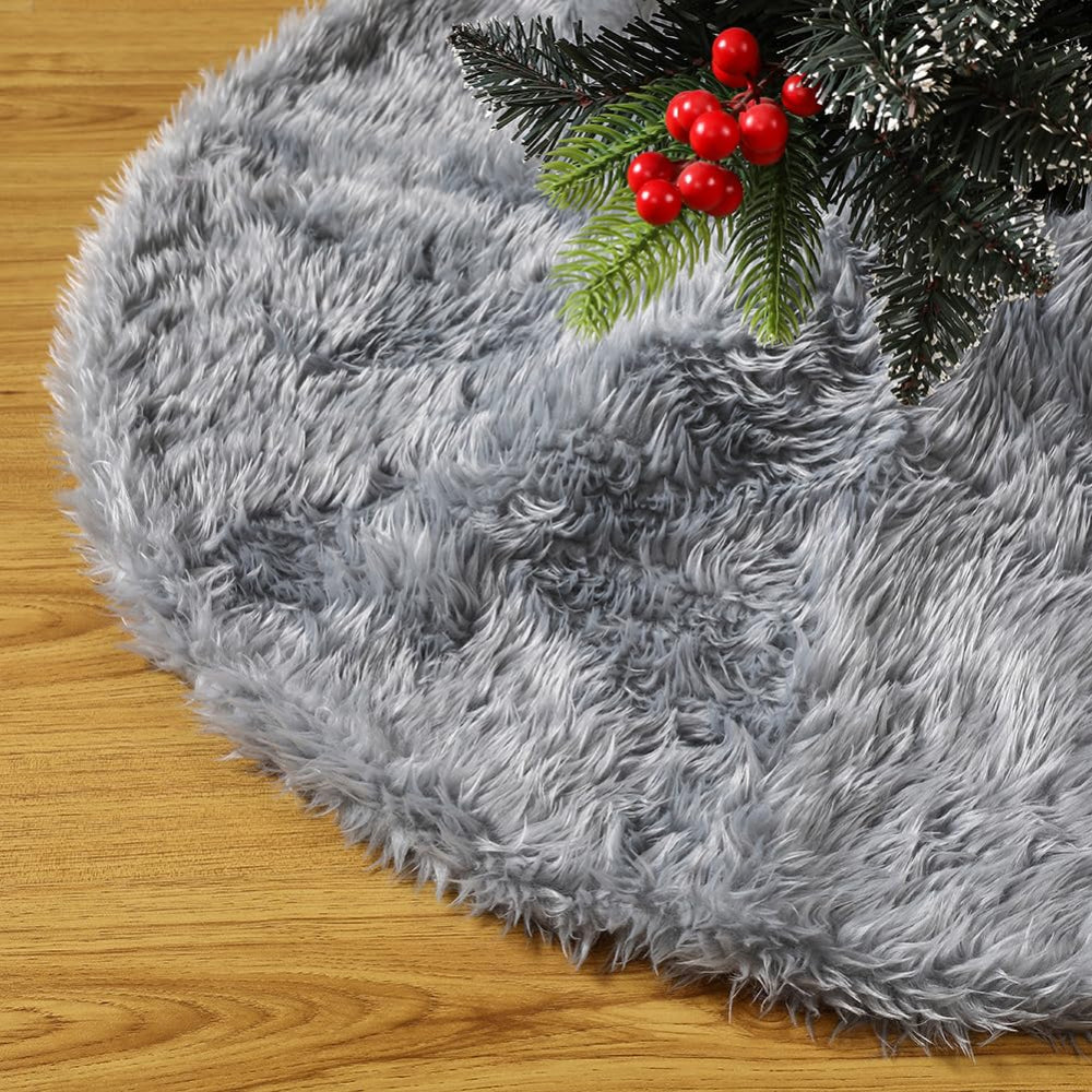 Cozy 30-inch plush faux fur Christmas tree skirt in soft white with a luxurious texture, perfect for adding warmth and elegance to your holiday decor. 2