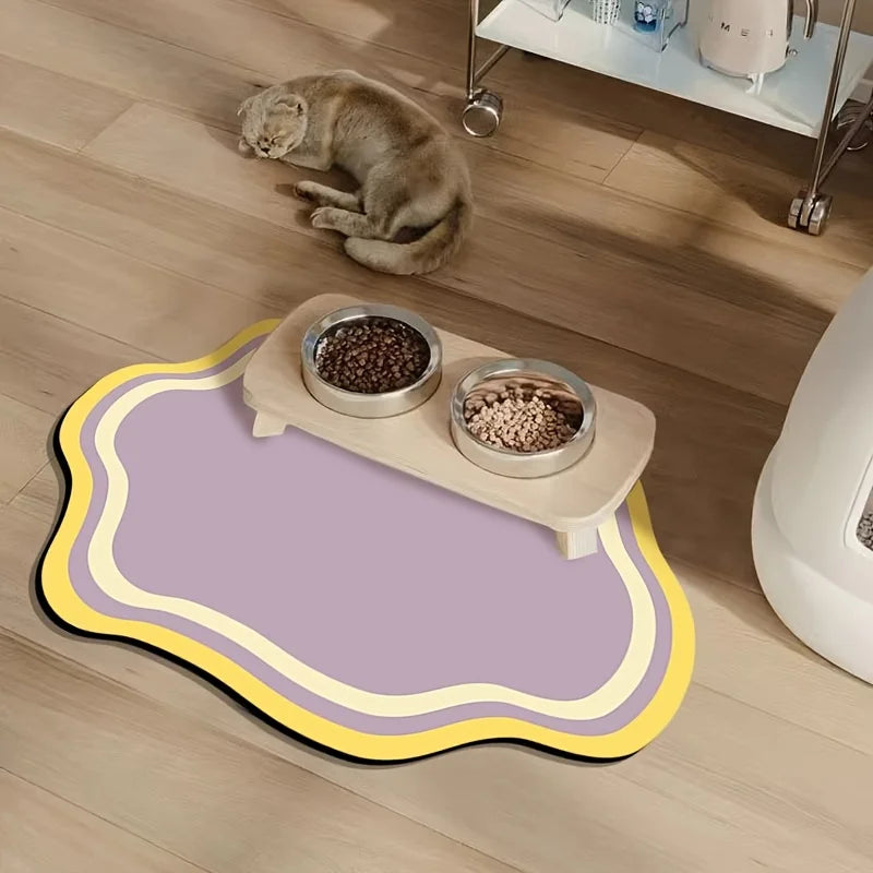 Quick-dry non-slip pet feeding mat for dogs and cats, measuring 30x40cm. Features a durable, waterproof surface with a stylish paw 1