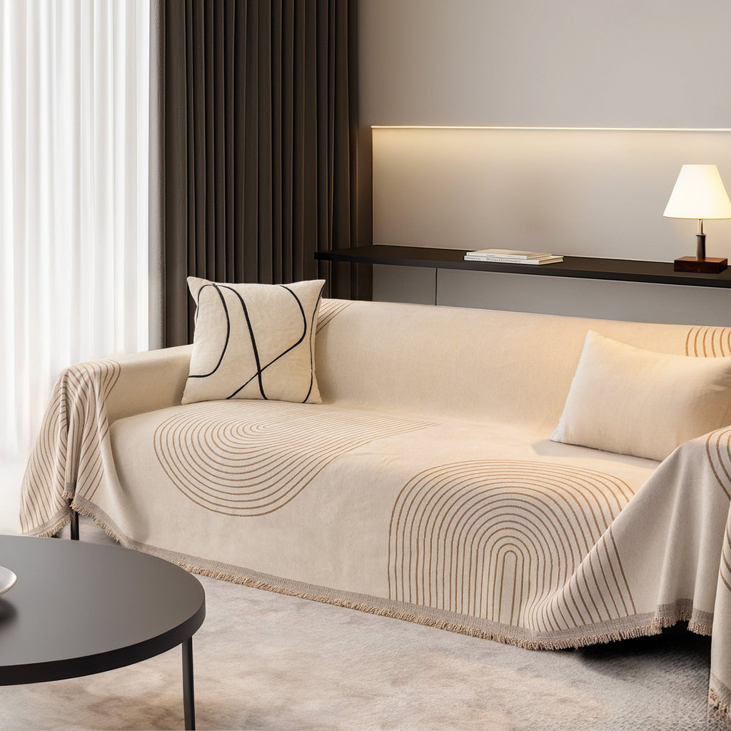 Reversible chenille sofa cover in soft beige and textured cream, designed for pet-friendly use. This cozy slipcover adds protection and style to your couch 1