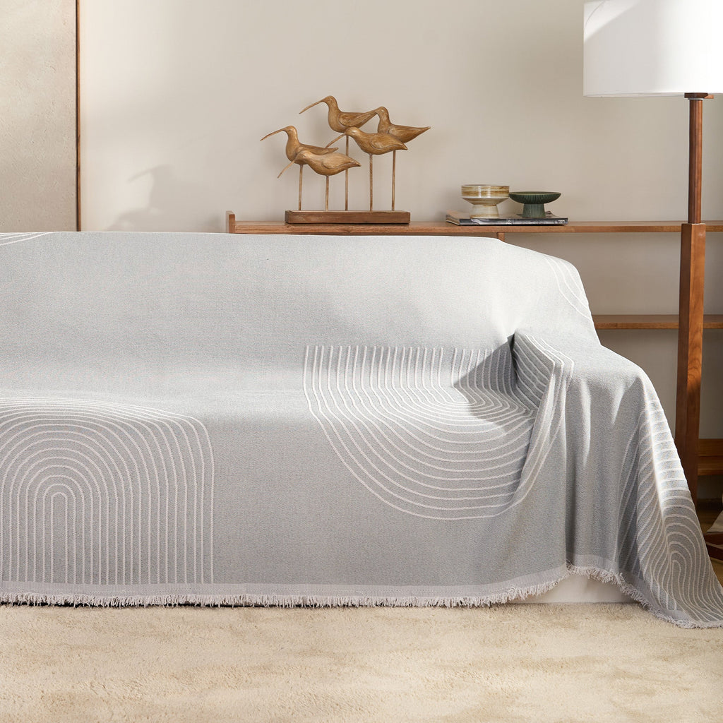 Reversible chenille sofa cover in soft beige and textured cream, designed for pet-friendly use. This cozy slipcover adds protection and style to your couch 10