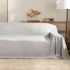 Reversible chenille sofa cover in soft beige and textured cream, designed for pet-friendly use. This cozy slipcover adds protection and style to your couch 10