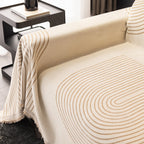 Reversible chenille sofa cover in soft beige and textured cream, designed for pet-friendly use. This cozy slipcover adds protection and style to your couch 4