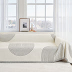 Reversible chenille sofa cover in soft beige and textured cream, designed for pet-friendly use. This cozy slipcover adds protection and style to your couch 7