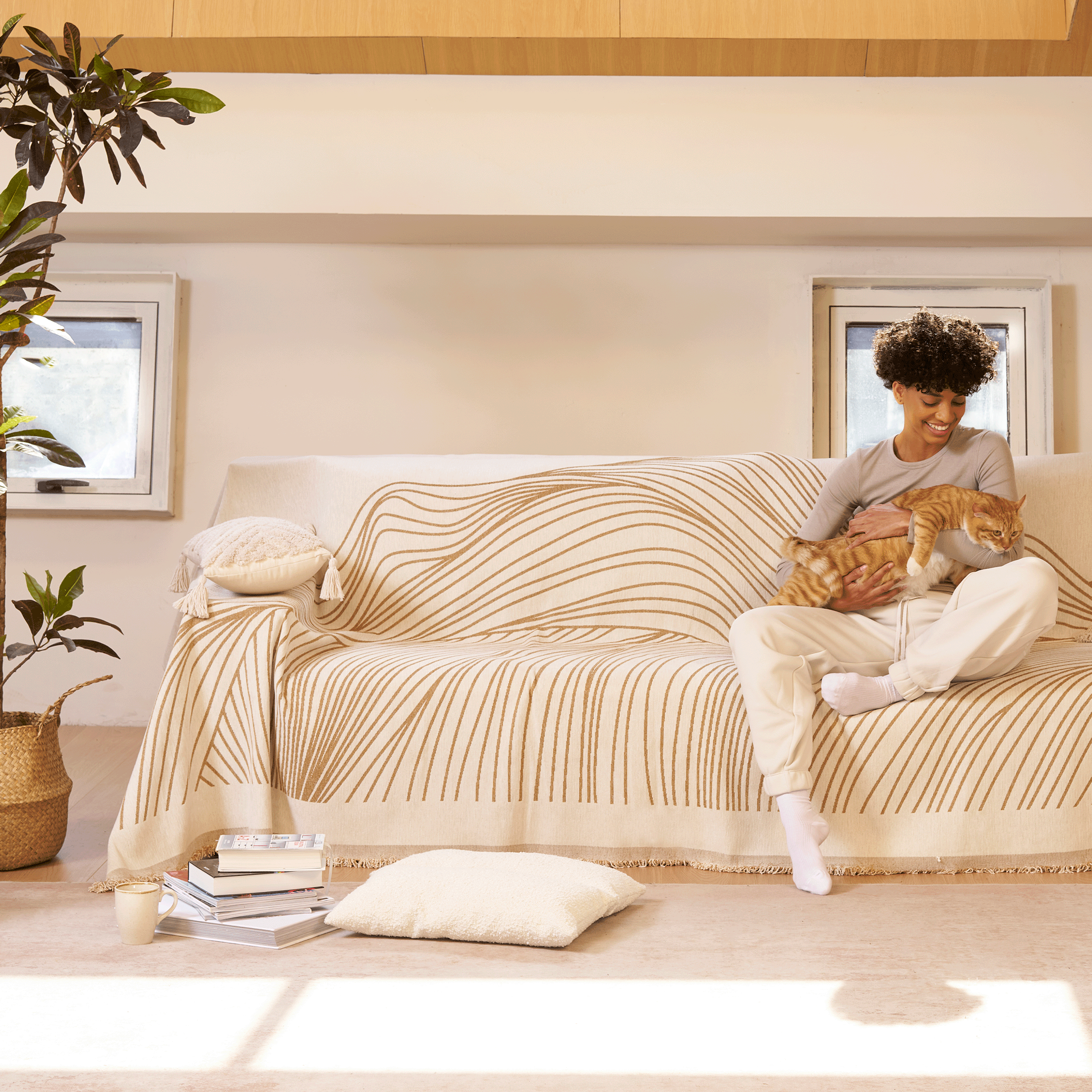 Reversible jacquard sofa cover in soft gray and cream, featuring an intricate woven pattern. Made from durable, pet-friendly fabric, it effortlessly protects 7