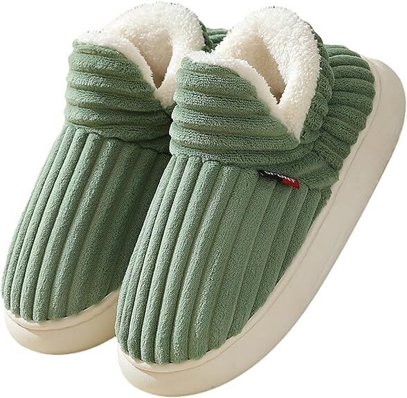 Beige ribbed fabric women's slippers featuring a cozy design for stylish comfort. The soft texture and slip-on style make them perfect for indoor wear, providing 2