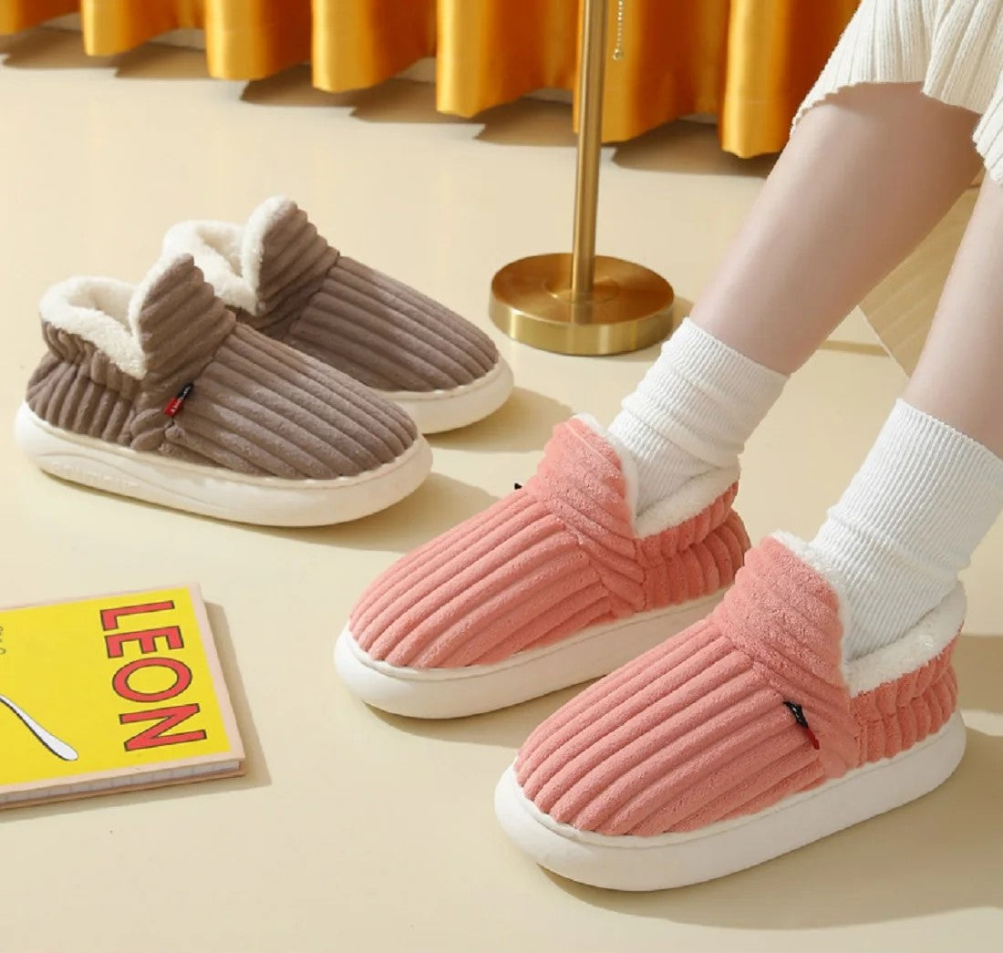 Beige ribbed fabric women's slippers featuring a cozy design, perfect for lounging. These stylish slippers offer comfort with a soft interior and a durable outsole, 7