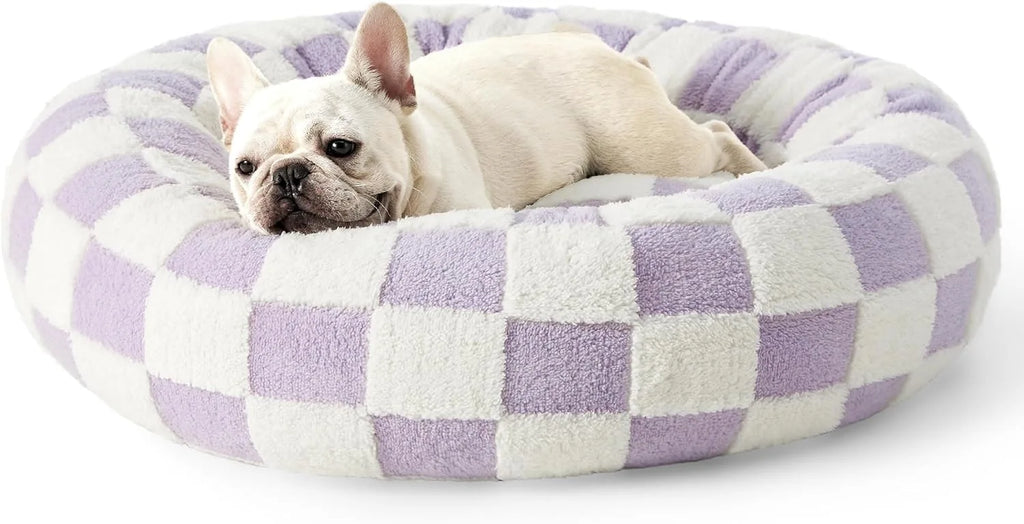 Round soft cozy pet bed for dogs and cats in a warm gray color. Features plush padding for comfort, a removable washable cover, and a non-slip 6