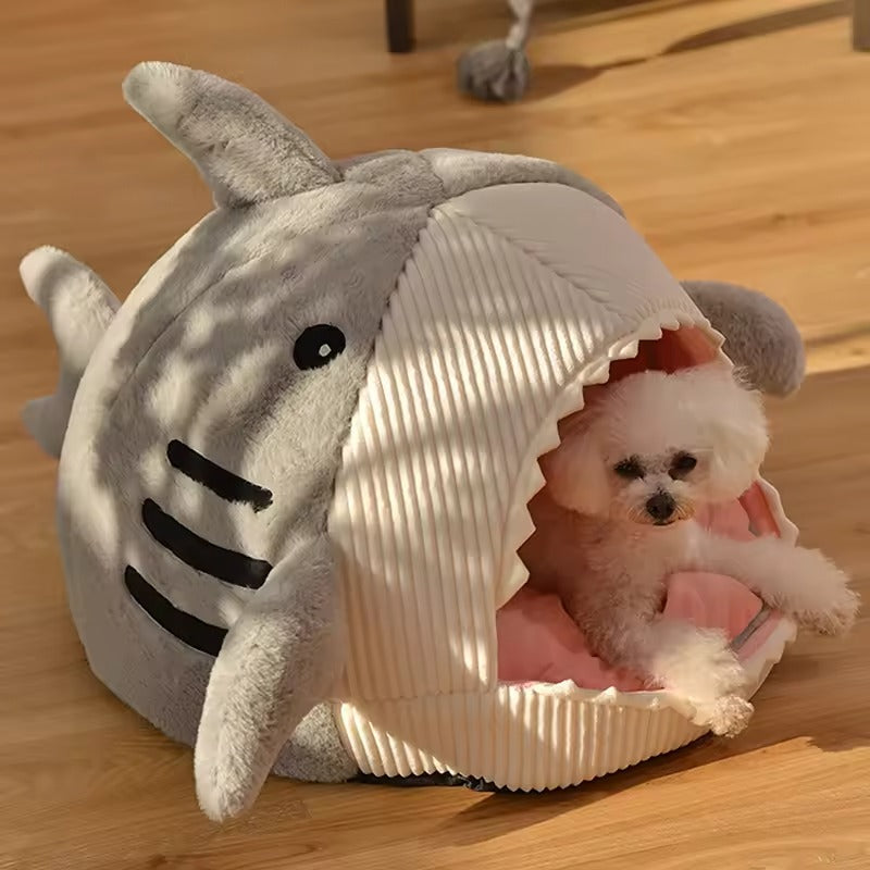 Cozy shark-shaped cat bed made from soft corduroy and plush materials. Available in three sizes, this pet cave features a playful design in ocean 1