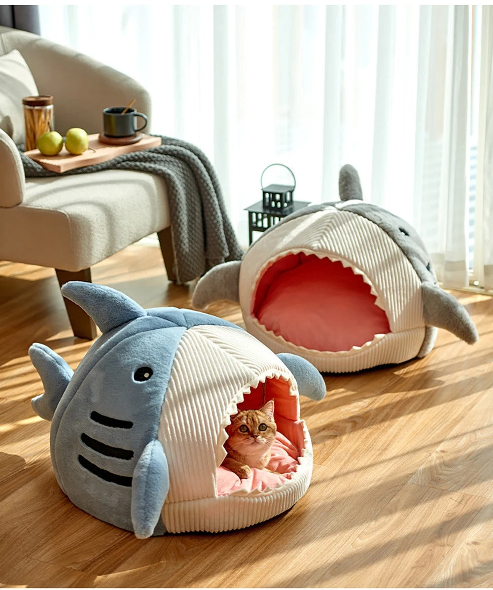 Shark-shaped cat bed made of soft corduroy and plush fabric, providing a cozy pet cave for cats. Available in three sizes, featuring a 2