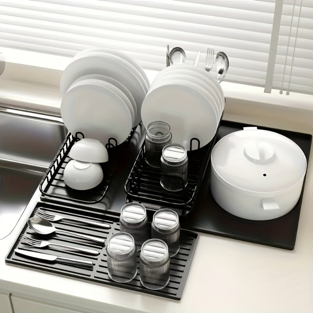 Black silicone coffee bar mat featuring a sleek, modern design. Heat-resistant and waterproof, it provides a durable surface for coffee setups, ensuring easy cleanup and 3