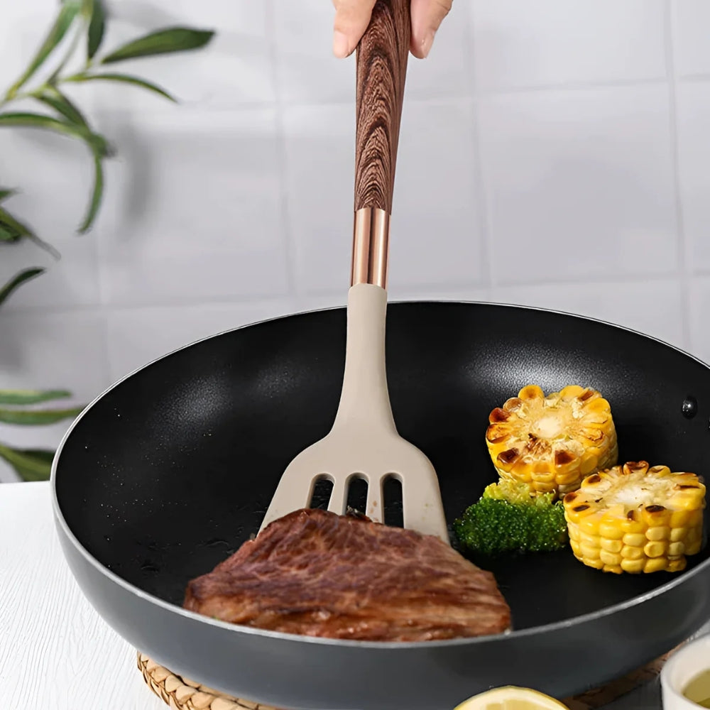 10-piece silicone cooking utensils set featuring heat-resistant tools in vibrant colors. Ergonomic design for comfort, suitable for non-stick cookware. Ideal for modern kitchens 2