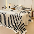 Luxurious soft taff velvet blanket in rich navy blue, featuring a plush texture perfect for cozying up at home or the office. Ideal for layered 2