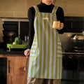 Stylish striped kitchen apron in a vibrant color palette, made from a soft microfiber blend. Features convenient pockets for utensils and tools, perfect for cooking and 0