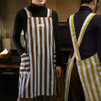 Stylish striped kitchen apron in a vibrant color palette, made from a soft microfiber blend. Features convenient pockets for utensils and tools, perfect for cooking and 1