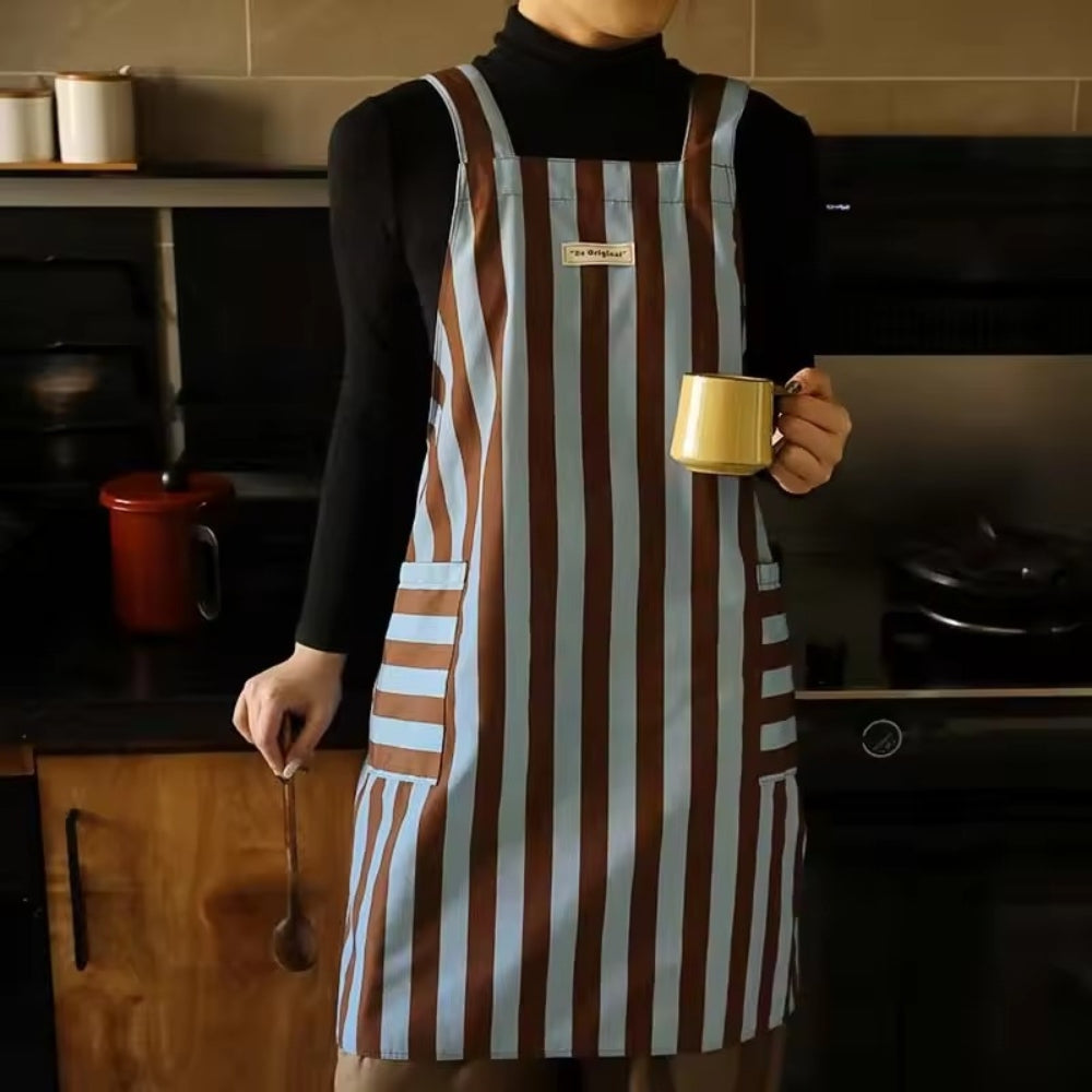 Stylish striped kitchen apron in a vibrant color palette, made from a soft microfiber blend. Features convenient pockets for utensils and tools, perfect for cooking and 4