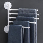 Space-saving swivel towel rack made of durable ABS plastic, featuring a sleek modern design. Ideal for bathrooms, it offers multiple arms for hanging towels, finished 0