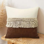 Set of two 18x18 inch throw pillows in soft fabric featuring neutral tones and stylish tassel accents, perfect for bohemian home decor. Ideal 2