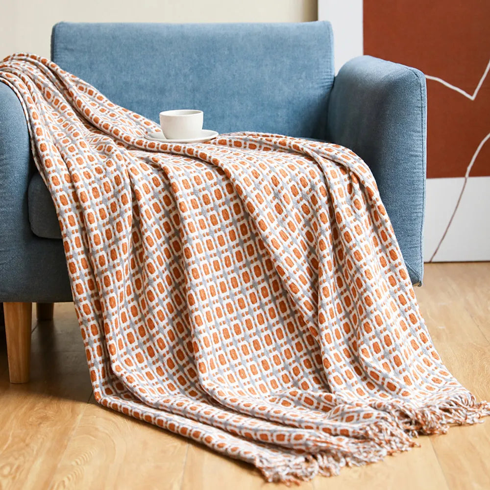 Throw blanket – Knitted fabric – Navy blue checkered design – Cozy sofa accessory with tassels 1