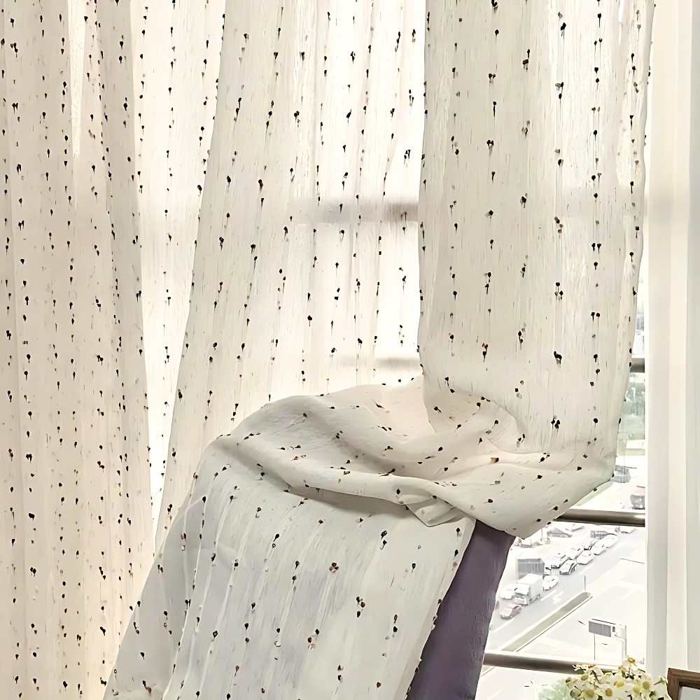 Sheer tulle curtain featuring vibrant rainbow embroidery, crafted from a soft microfiber and cotton blend. Measures 50 × 84 inches, ideal for adding 1