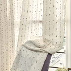 Sheer tulle curtain featuring vibrant rainbow embroidery, crafted from a soft microfiber and cotton blend. Measures 50 × 84 inches, ideal for adding 1