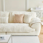 Cream velvet striped sofa cover featuring a non-slip design, perfect for protecting and enhancing the look of your couch. Soft texture and elegant stripes add a touch 1