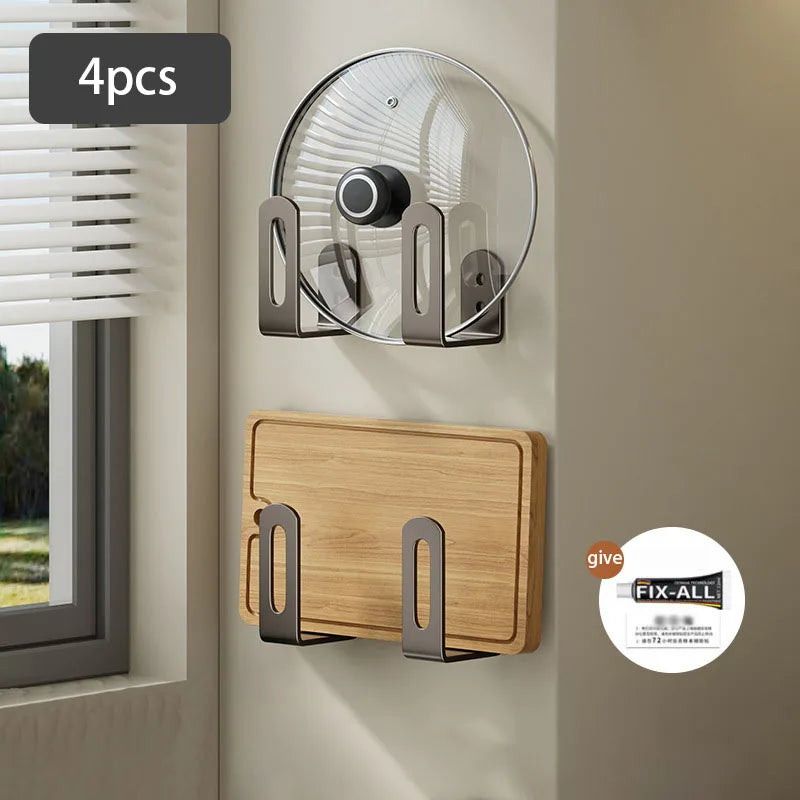 Set of two wall-mounted kitchen racks in sleek black metal, designed for multifunctional storage. Ideal for holding cutting boards and pot covers, also suitable for 9