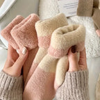 Set of four pairs of warm terry socks for women in cozy mid-tube design. Available in assorted colors, these soft, plush socks offer comfort 1