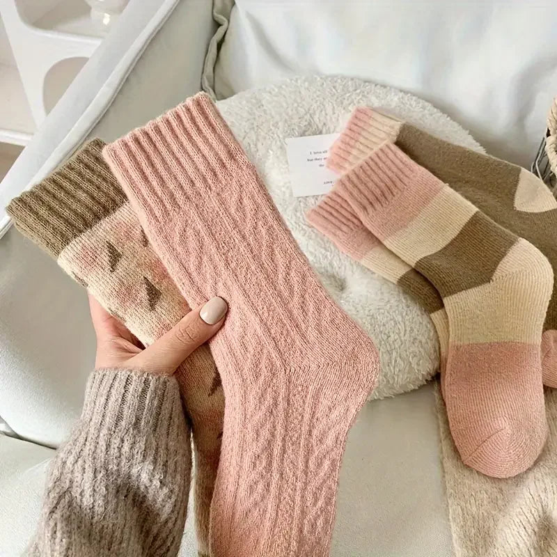 Set of four cozy mid tube terry socks for women, featuring a soft and warm design. Available in assorted colors, these socks are perfect for keeping 3