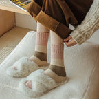 Set of four pairs of warm terry socks for women, featuring a cozy mid-tube design. Each pair is crafted from soft, plush fabric in 5