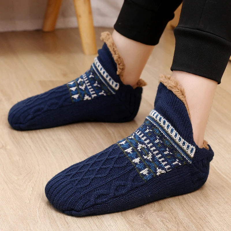 Warm winter non-slip grip socks in a soft, plush fabric with a cozy, textured interior. Features a stylish pattern and rubberized soles for added stability 0